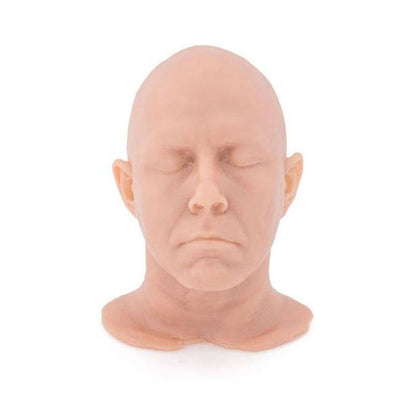 A Pound of Flesh Shrunken Head Tattoo Practice Skin - Bloody Wolf Tattoo Supply