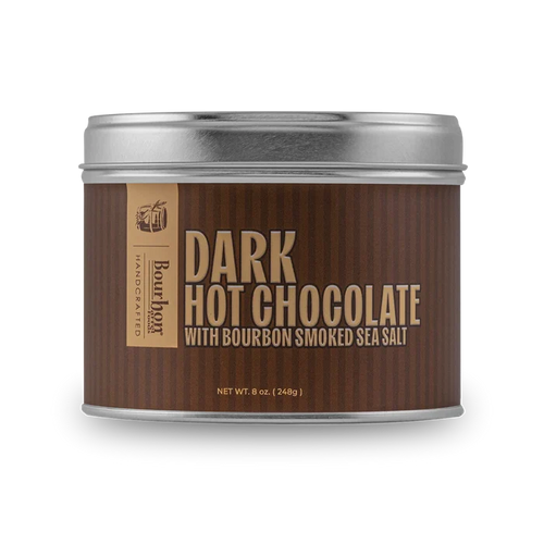 Tin of dark hot chocolate with bourbon smoked sea salt on a white background