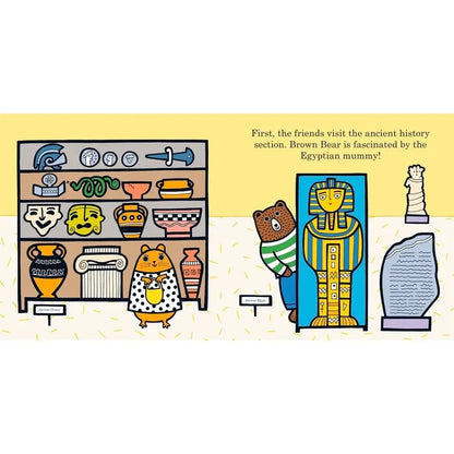 Illustration of a bear character in a museum with Egyptian-themed exhibits.