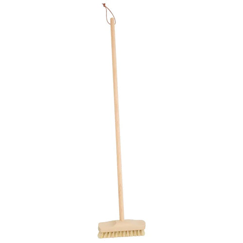 Broom with a wooden handle and bristle head on a white background