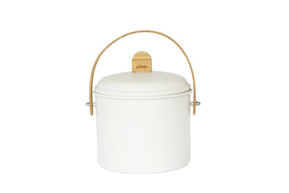 A white cylindrical scompost bin with a matching lid, featuring a light wood handle grip and a wooden carrying handle, set against a plain white background.
