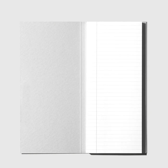 An open notebook or journal with a textured light gray cover on the left and white lined pages on the right, shown against a light gray background.