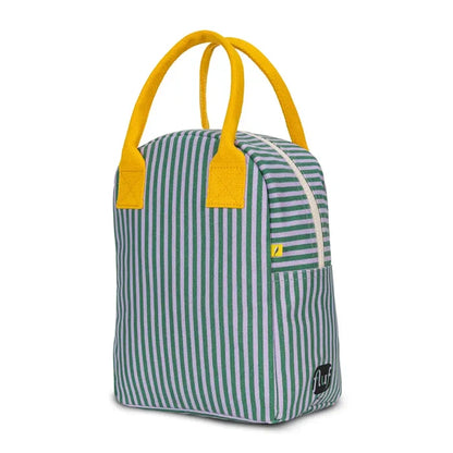 Blue and white striped bag with yellow handles on a white background