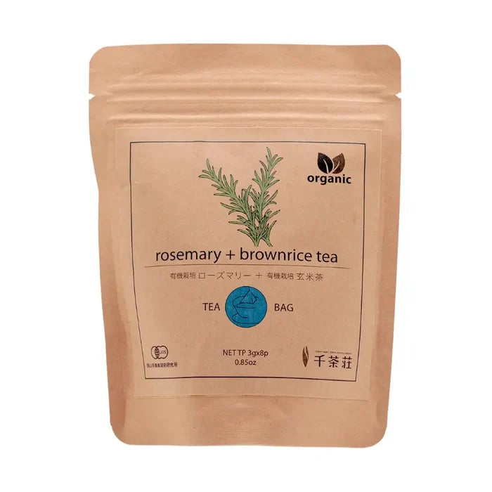 Tea bag packaging with rosemary and brown rice label on a white background