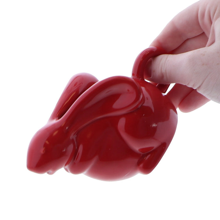 red ceramic pitcher
