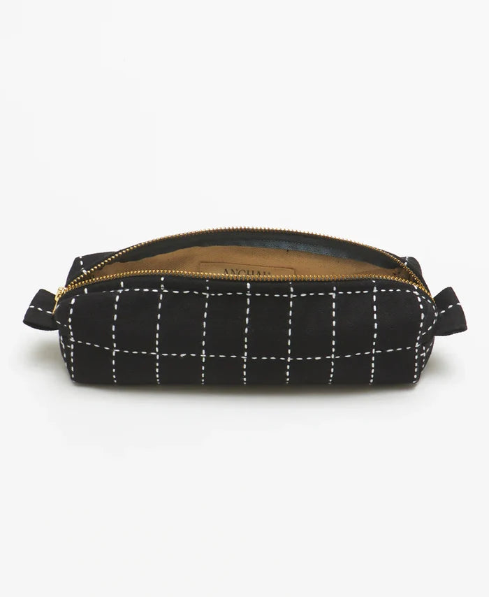 Black grid-patterned pouch with a gold zipper on a white background