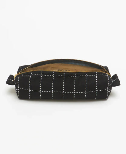 Black grid-patterned pouch with a gold zipper on a white background