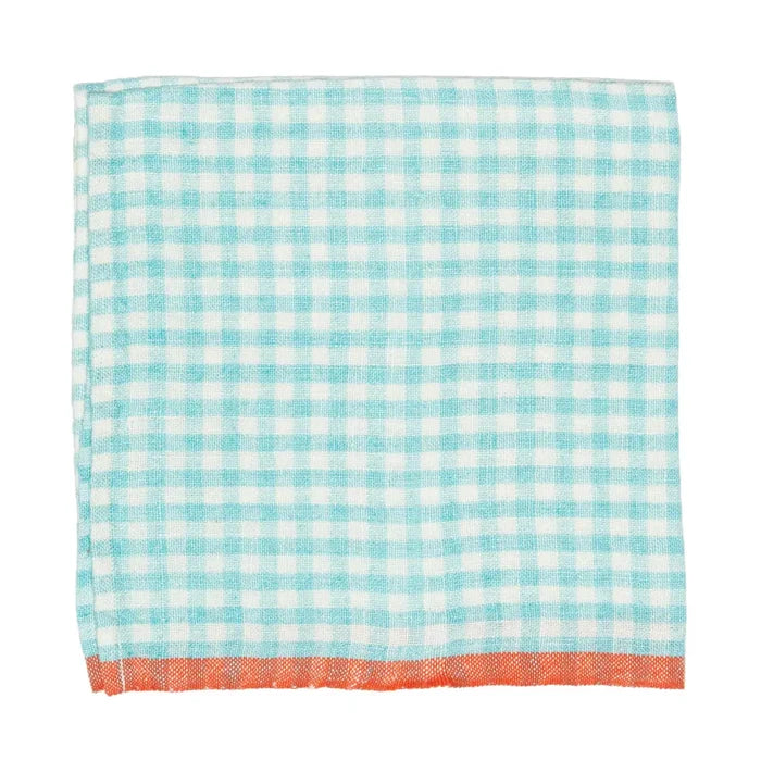 A square napkin with a light blue gingham check pattern and a solid orange-red fringed border.