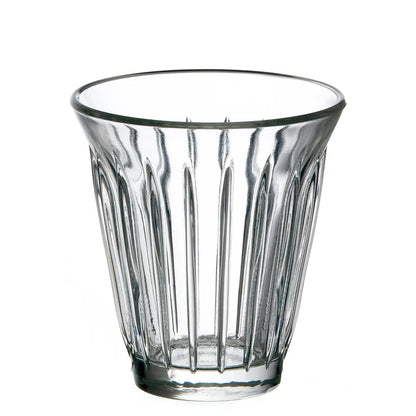 Clear glass tumbler with vertical ridges on a white background